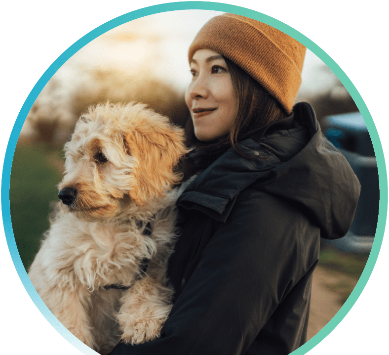 Woman playing with her pet dog