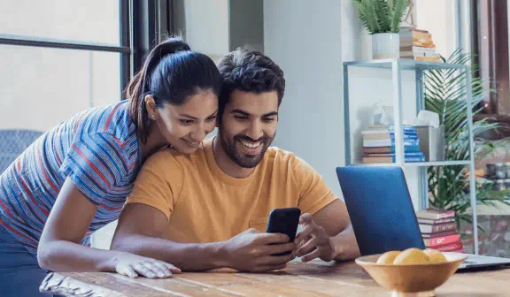 Couple looking at phone