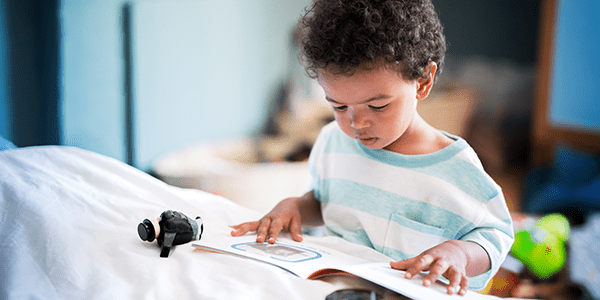 child reading a book