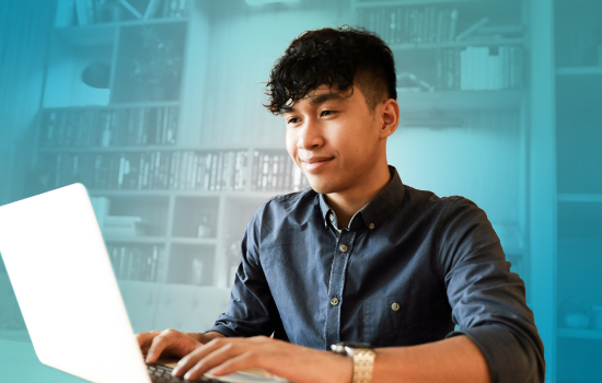 Young man working on a laptop computer