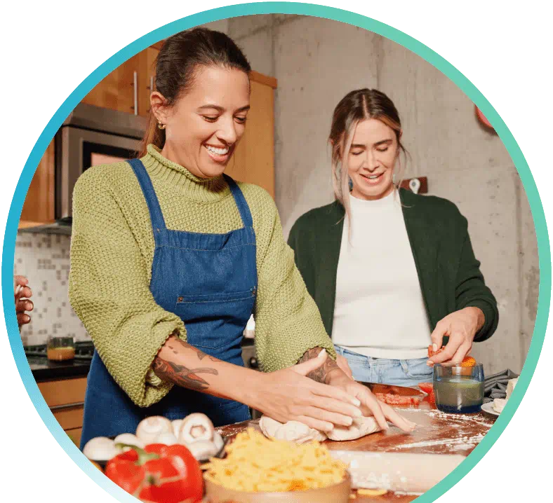 Two people preparing food.