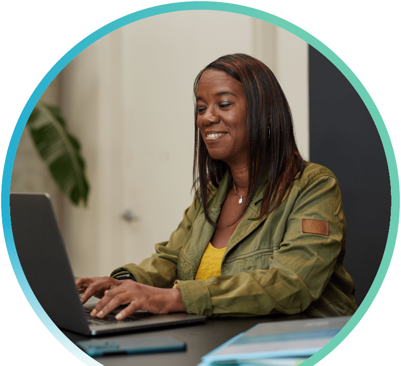 Woman working on her laptop.