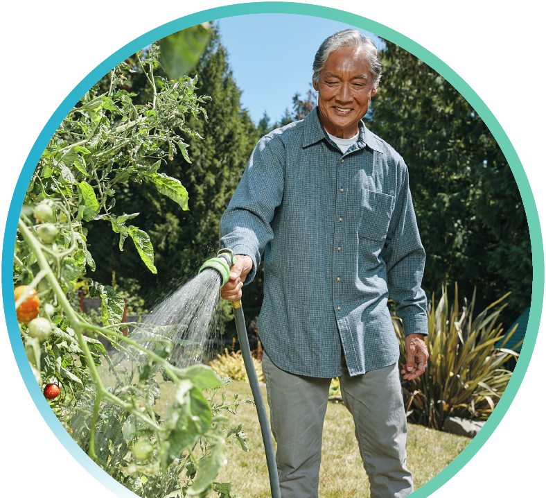 Person watering grass