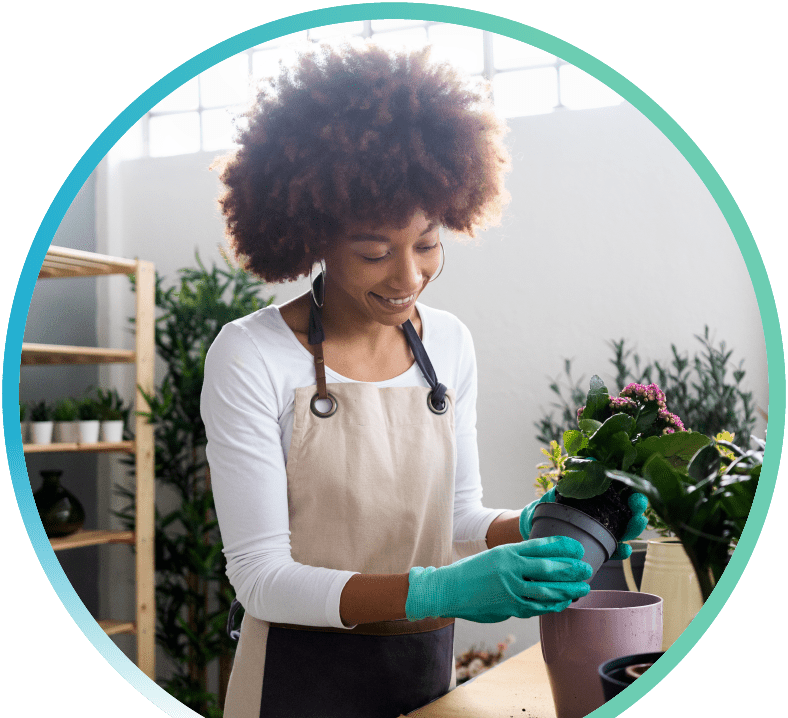 Person watering plants