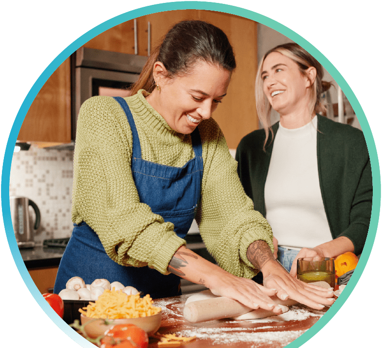 Two women preparing food.