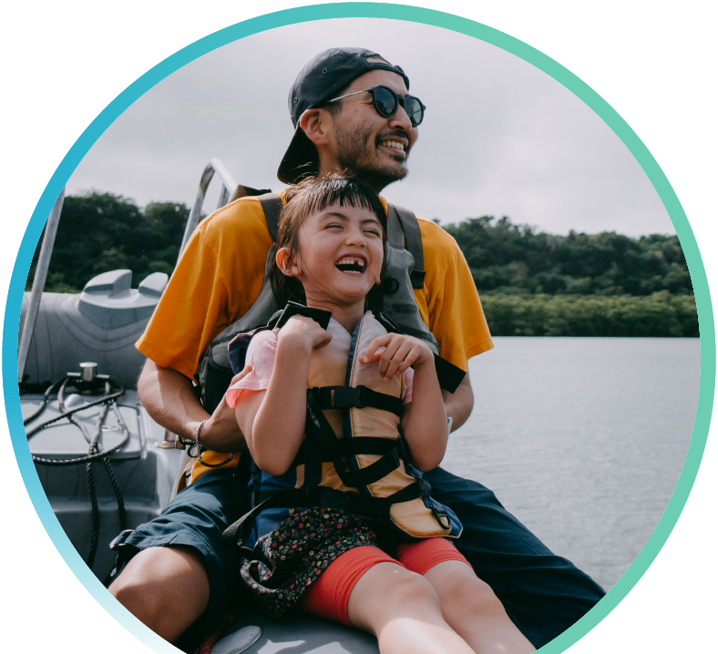 Father and son enjoying their time on a boat.