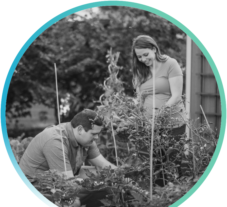 Two people outside gardening