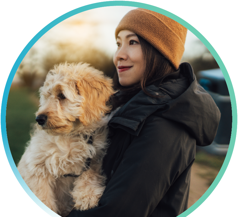 Woman playing with her pet dog